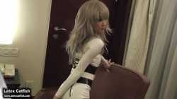 Playing Latex Catsuit in hotel