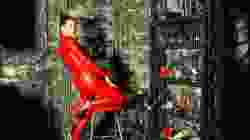 Latex Girl in a red rubber catsuit