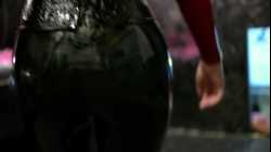 Alla trying black-red latex catsuit