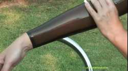 Latex Model Dressing up in Latex