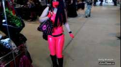 Latex Girl with pink rubber catsuit, gloves, mask and fashionable boots shopping in Agra mall on WGT