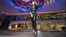 High heels Leather girl. The girl dances in the Leggings.