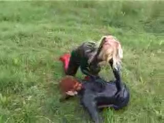 outdoor catfight in tight latex