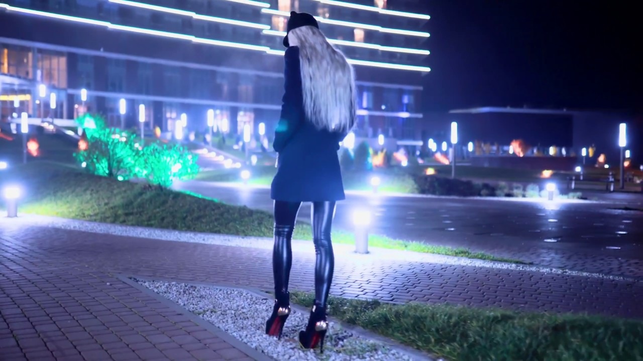 Confident Walk in Black Leather Leggings and High Heels Boots