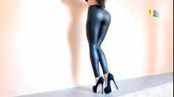 High heels walk. Girl in Leather Leggings