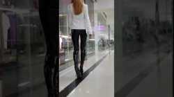 Walking in the MEGAMOLL in latex (Olga Madych)